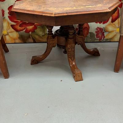 Sale Photo Thumbnail #158: Octagonal Table crafted from Walnut and Burr Walnut featuring exquisite marquetry inlay
29" Wide X 19.5" Tall