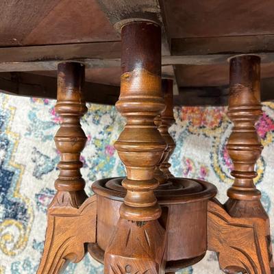 Sale Photo Thumbnail #153: Octagonal Table crafted from Walnut and Burr Walnut featuring exquisite marquetry inlay
29" Wide X 19.5" Tall