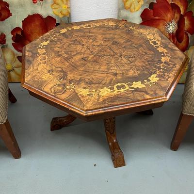 Sale Photo Thumbnail #159: Octagonal Table crafted from Walnut and Burr Walnut featuring exquisite marquetry inlay
29" Wide X 19.5" Tall