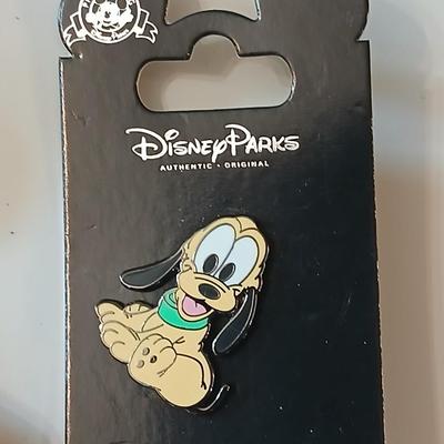Disney pins - vintage Donald duck figure with whistle beak and a Tigger watch face