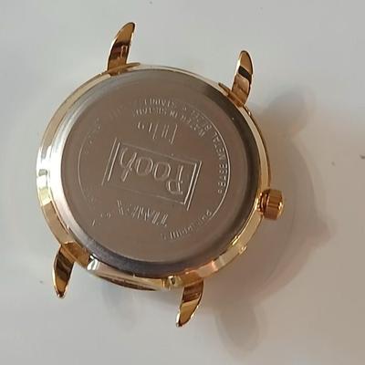 Disney pins - vintage Donald duck figure with whistle beak and a Tigger watch face