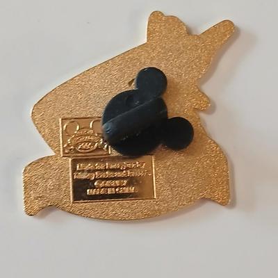 Disney pins - vintage Donald duck figure with whistle beak and a Tigger watch face