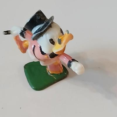Disney pins - vintage Donald duck figure with whistle beak and a Tigger watch face