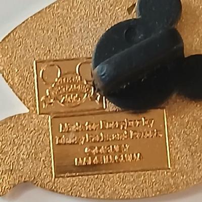 Disney pins - vintage Donald duck figure with whistle beak and a Tigger watch face