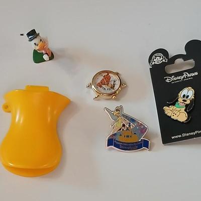 Disney pins - vintage Donald duck figure with whistle beak and a Tigger watch face