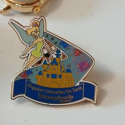 Disney pins - vintage Donald duck figure with whistle beak and a Tigger watch face