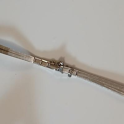 Three women's watches -Caravelle, Milan, Vintage Timex Indiglo