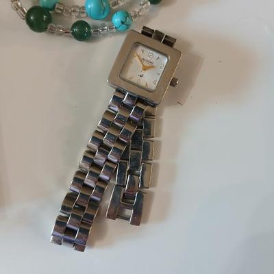 Necklace, earrings, bracelet matching set with a Freeport watch