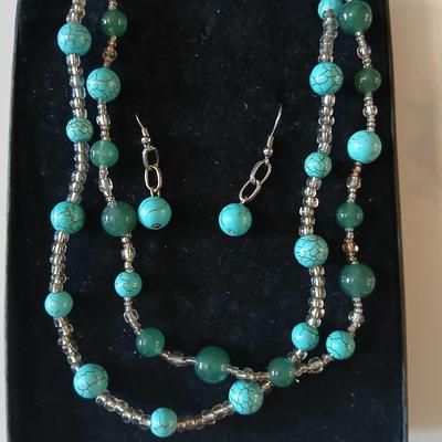 Necklace, earrings, bracelet matching set with a Freeport watch