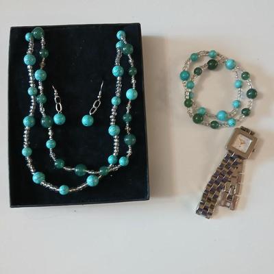 Necklace, earrings, bracelet matching set with a Freeport watch