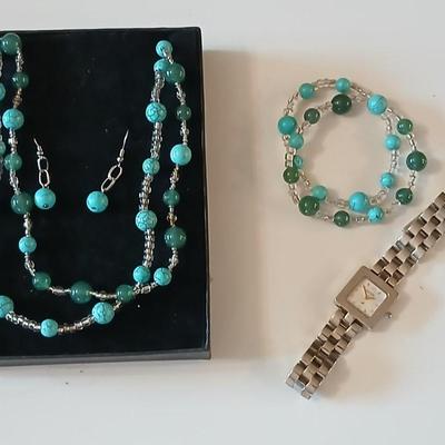 Necklace, earrings, bracelet matching set with a Freeport watch