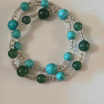 Necklace, earrings, bracelet matching set with a Freeport watch