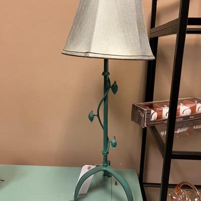 Sale Photo Thumbnail #166: Pair of Teal Metal Table Lamp with decorative vine and leaf accents on the stem and a matching light colored drum shade.
Measures 29" tall