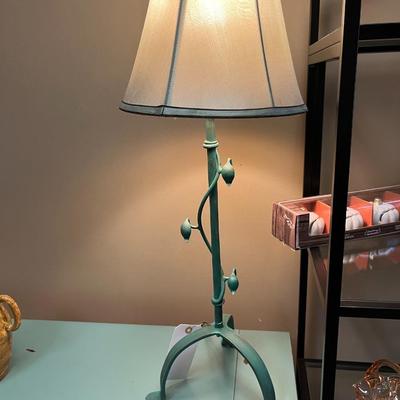 Sale Photo Thumbnail #165: Pair of Teal Metal Table Lamp with decorative vine and leaf accents on the stem and a matching light colored drum shade.
Measures 29" tall
