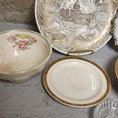 Sale Photo Thumbnail #280: Lamp parts, trays, bowls, souvenir plates and a wee little wind chime.