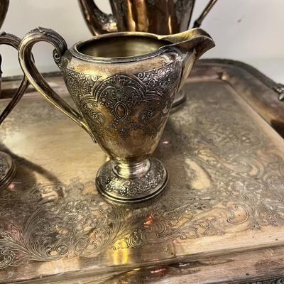 Sale Photo Thumbnail #189: Vintage Wilcox Silver Plate Paisley Pattern Tea Set featuring the Paisley Pattern design characterized by ornamental paisley figures and often embellished with leafy swags and floral motifs.  This ornate set was produced around the 1930's .  This set incl