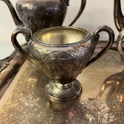Sale Photo Thumbnail #188: Vintage Wilcox Silver Plate Paisley Pattern Tea Set featuring the Paisley Pattern design characterized by ornamental paisley figures and often embellished with leafy swags and floral motifs.  This ornate set was produced around the 1930's .  This set incl