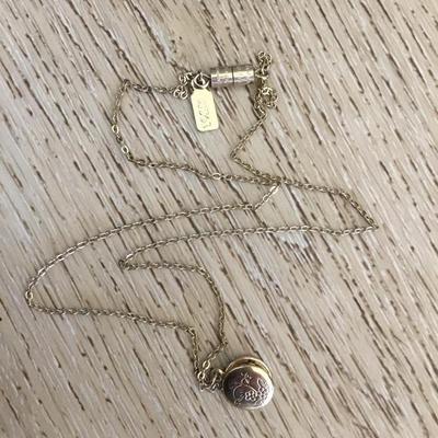 Cute vintage dainty 1928 Company, gold tone, locket necklace