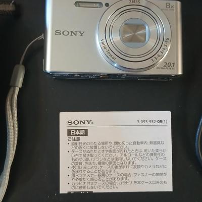Sony Cybershot digital camera DSC-W830 with charger, case, and original packaging