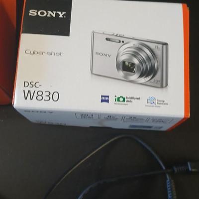 Sony Cybershot digital camera DSC-W830 with charger, case, and original packaging