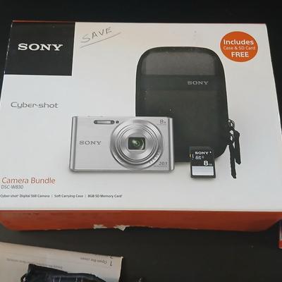 Sony Cybershot digital camera DSC-W830 with charger, case, and original packaging