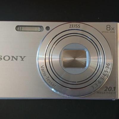Sony Cybershot digital camera DSC-W830 with charger, case, and original packaging
