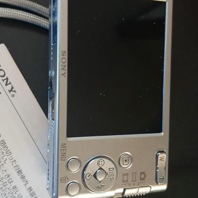 Sony Cybershot digital camera DSC-W830 with charger, case, and original packaging