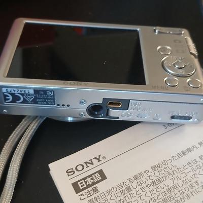 Sony Cybershot digital camera DSC-W830 with charger, case, and original packaging