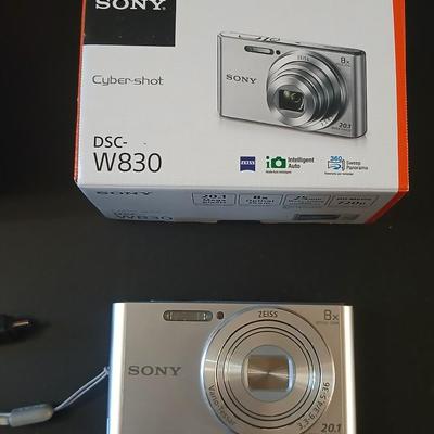 Sony Cybershot digital camera DSC-W830 with charger, case, and original packaging