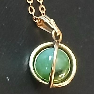 Gold toned jewelry with stones - necklace - and earrings with two additional gold toned chains