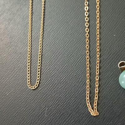 Gold toned jewelry with stones - necklace - and earrings with two additional gold toned chains