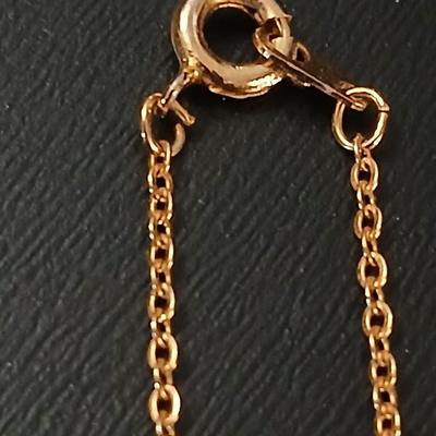 Gold toned jewelry with stones - necklace - and earrings with two additional gold toned chains