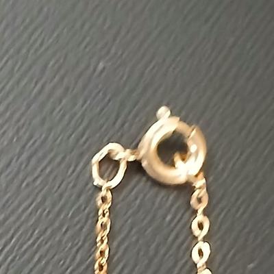 Gold toned jewelry with stones - necklace - and earrings with two additional gold toned chains