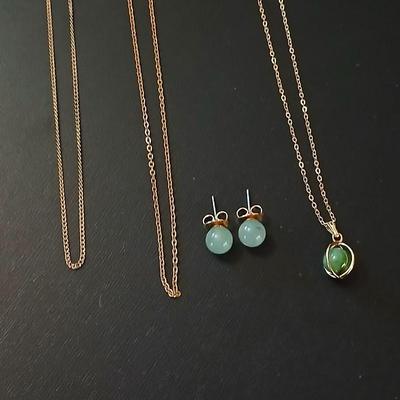 Gold toned jewelry with stones - necklace - and earrings with two additional gold toned chains