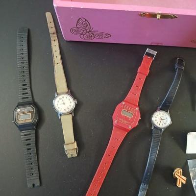 Vintage musical Jewelry box with miss matched Jewlery some watches and an assortment of pins