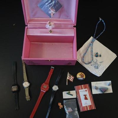 Vintage musical Jewelry box with miss matched Jewlery some watches and an assortment of pins