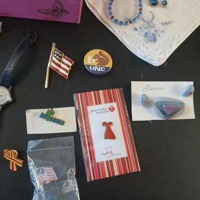 Vintage musical Jewelry box with miss matched Jewlery some watches and an assortment of pins