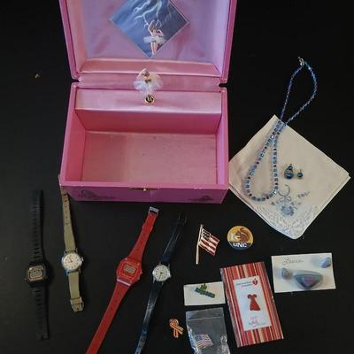 Vintage musical Jewelry box with miss matched Jewlery some watches and an assortment of pins