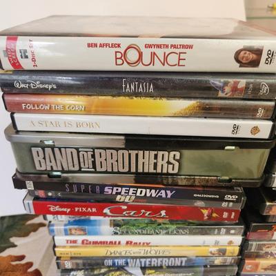 lot of DVD Movies , NASA 25 Years 5 Vol. , WWII, Speedway 60, Band of Brothers, Batman the Movie and many more