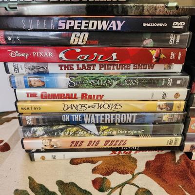 lot of DVD Movies , NASA 25 Years 5 Vol. , WWII, Speedway 60, Band of Brothers, Batman the Movie and many more