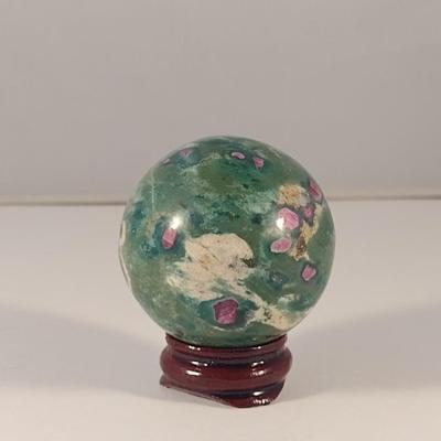 Stone Sphere with Wooden Stand