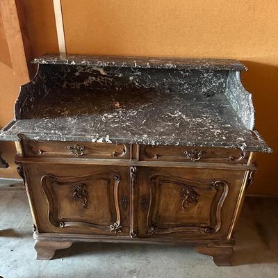 Sale Photo Thumbnail #8: Beautiful French Dry Sink Marble Top Dresser/Cabinet. Mirror is included but not shown in photos. It unfortunately is in another storage unit but will be clearing out in next few days and be added to the ad. 

Measurements as shown in photos: 
25.5” x 4