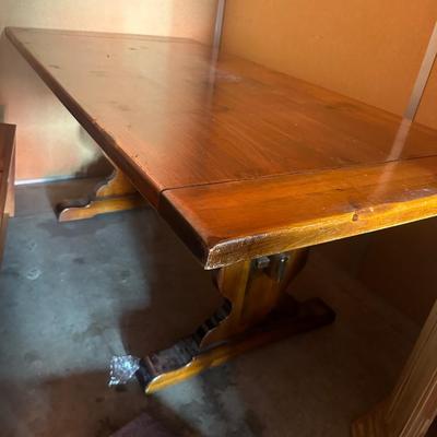 Sale Photo Thumbnail #9: Beautifully preserved antique trestle dining table featuring a solid rectangular top supported by classic trestle-style legs joined with a sturdy stretcher. A timeless design that combines durability with understated elegance, suitable for both traditiona