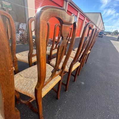 Sale Photo Thumbnail #14: Vintage Italian Venetian dining chairs with carved wood backs, graceful cabriole legs, and tightly woven rush seats—elegant yet relaxed for traditional or eclectic settings.
Origin: Made in Italy
Quantity: 10 chairs
Dimensions (each):
43" H (back) × 20