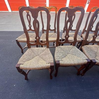 Sale Photo Thumbnail #15: Vintage Italian Venetian dining chairs with carved wood backs, graceful cabriole legs, and tightly woven rush seats—elegant yet relaxed for traditional or eclectic settings.
Origin: Made in Italy
Quantity: 10 chairs
Dimensions (each):
43" H (back) × 20