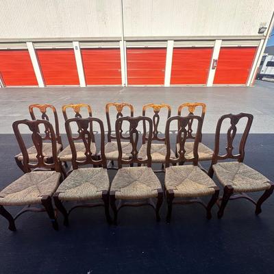 Sale Photo Thumbnail #10: Vintage Italian Venetian dining chairs with carved wood backs, graceful cabriole legs, and tightly woven rush seats—elegant yet relaxed for traditional or eclectic settings.
Origin: Made in Italy
Quantity: 10 chairs
Dimensions (each):
43" H (back) × 20