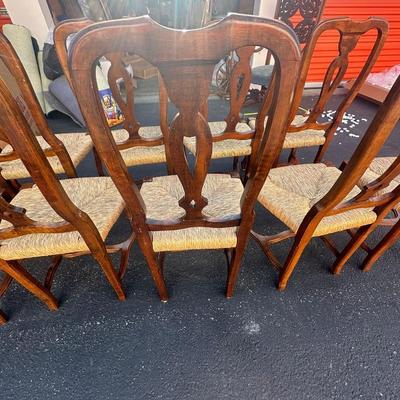 Sale Photo Thumbnail #16: Vintage Italian Venetian dining chairs with carved wood backs, graceful cabriole legs, and tightly woven rush seats—elegant yet relaxed for traditional or eclectic settings.
Origin: Made in Italy
Quantity: 10 chairs
Dimensions (each):
43" H (back) × 20