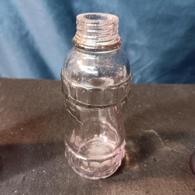 ANTIQUE GLASS PIECES WITH A PURPLE HUE