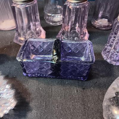 ANTIQUE GLASS PIECES WITH A PURPLE HUE