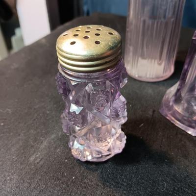 ANTIQUE GLASS PIECES WITH A PURPLE HUE